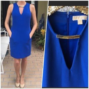 Micheal Kors blue dress. signature gold neckline